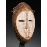 Tribal/Ethnographic: A white Idimu style face mask, Bwami society, Lega People (also Warega or