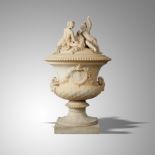 Planter: A Louis XIV style terracotta urn, 19th century, with later composition stone socle