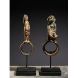 Tribal/Ethnographic: A pair of bronze rings representing two riders, Dogon People, Mali, 2nd quarter