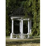 Arbour: † A large carved limestone and wrought iron rotunda, modern, 475cm high by 305cm diameter