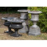 Plant pots/Planters: A pair of cast iron urns, 2nd half 19th century, 45cm high, together with