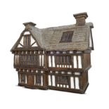 Toys and Dolls/Collectibles: A unique Robert Stubbs wood and composition Tudor style dolls house