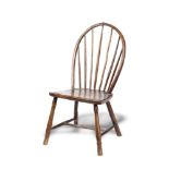 Furniture: A primitive wooden chair of small proportions, probably Welsh, 19th century, 64cm