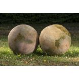 Finials: † A pair of carved sandstone gate pier balls modern46cm diameter