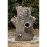 Plant pots/Urns: A fireclay planter in the form of a tree trunk, probably Scottish, late 19th