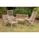 Garden Furniture: A suite of child’s hardwood furniture, 2nd half 20th century, comprising seat,