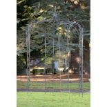 A wrought iron arbour, 2nd half 20th century, 300cm high by 192cm wide