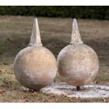 Finials: A pair of terracotta gate pier balls with spike terminalslate 19th century60cm high