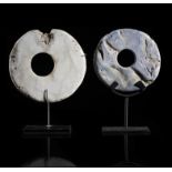 Tribal: A currency disc made from blue coral on stand Oceanic 29cm high overall