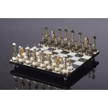 Tribal: A magnificent semi-precious stone chess set modern the black pieces made of dolerite,