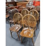 8 wheel back dining chairs