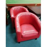 2 red faux leather arm chairs