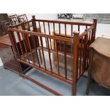 Edwardian inlaid mahogany cot