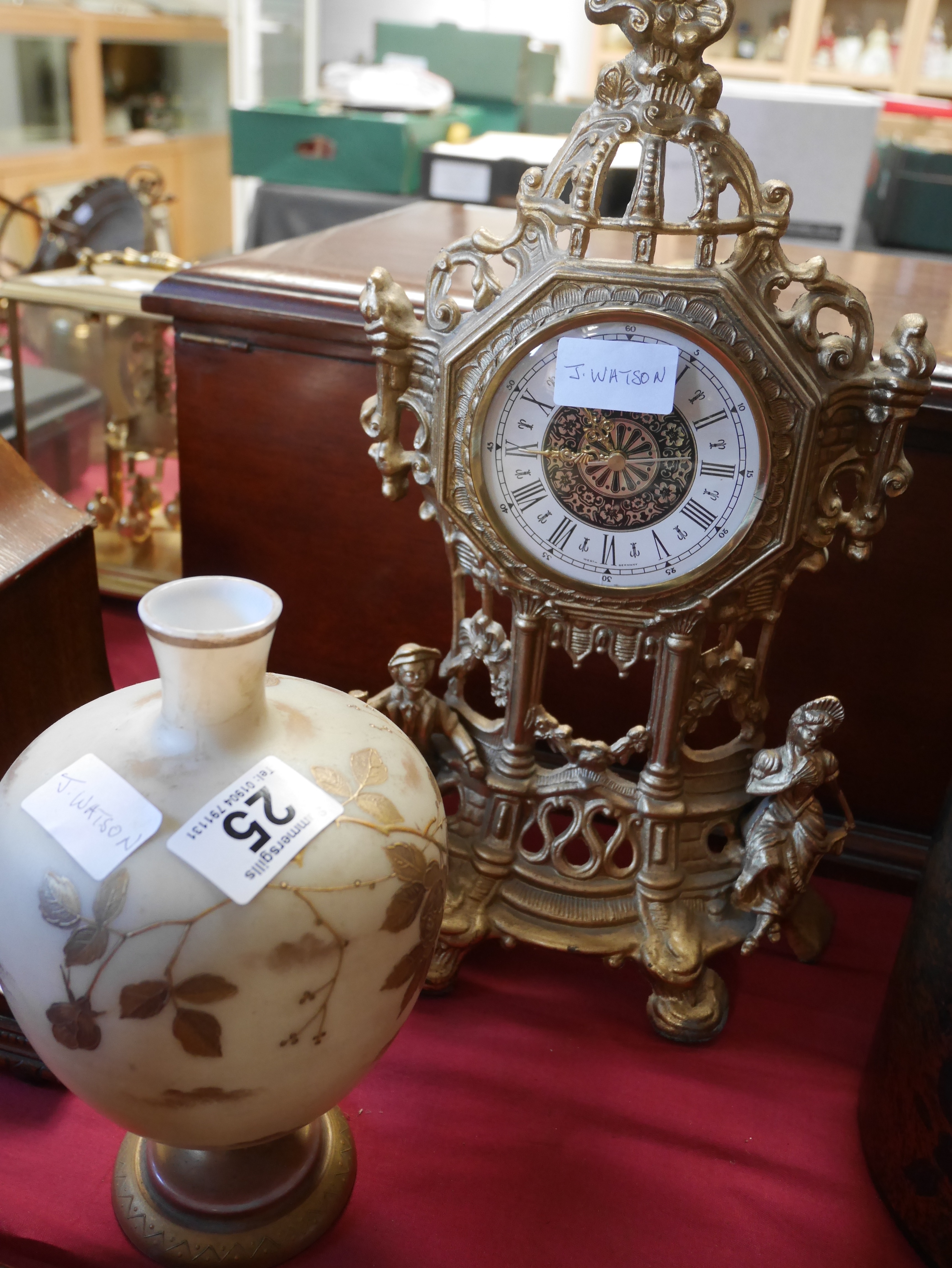 Brass mantle clock and vase