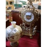 Brass mantle clock and vase