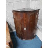 Antique mahogany bow front corner cupboard