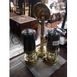 2 miners lamps and brass lamp