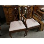 Pair of mahogany his and hers chairs