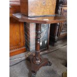 Rosewood antique table with claw feet