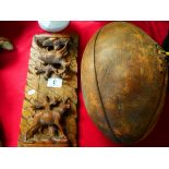 Old leather rugby ball and bookmark