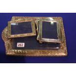 3silver picture frames plus 1 plated frame