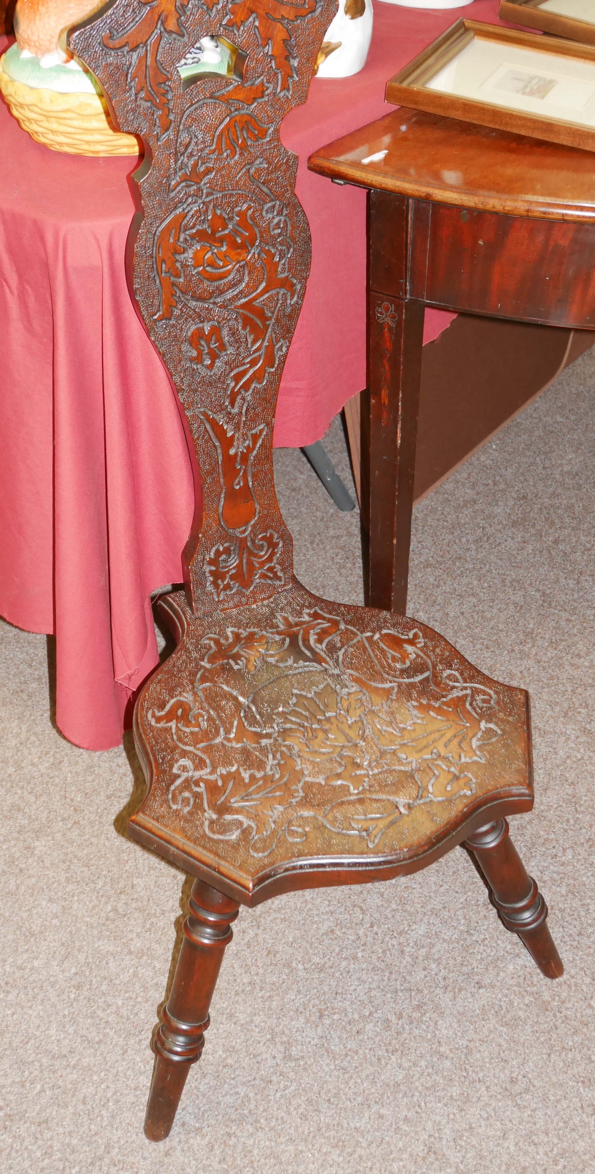 Antique carved spinning chair