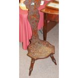 Antique carved spinning chair