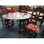 Early oak drop leaf dining table