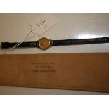 Gold ladies Raymond Weil watch