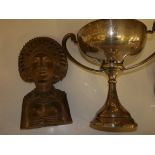 Silver trophy and head