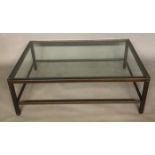 A CONTEMPORARY BRONZED STEEL COFFEE TABLE , with clear glass top 119 x 43 x 81 cm