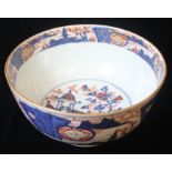A FINE LARGE KANGXI CHINESE IMARI PUNCHBOWL, The exterior decorated with Japanese style 'mons' and