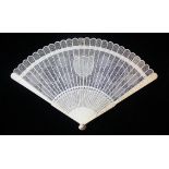 AN 18TH CENTURY CHINESE IVORY BRISEE FAN, Finely pierced with formal motifs enclosing a central