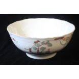 A QIANLONG 'FAMILLE-ROSE' VALENTINE PATTERN BOWL Decorated on both sides with a large oval vignettes