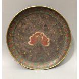 AN 18TH/19TH CENTURY JAPANESE CLOISONNÉ DISH Decorated in violet and burgundy enamel with stylized