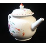 A CHINESE CHIENLUNG PERIOD FAMILLE ROSE GLOBULAR TEAPOT Hand painted with a floral design. (approx