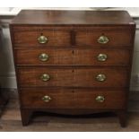 A GEORGIAN MAHOGANY CHEST of two short above three long graduating drawers, bracket feet