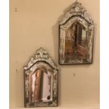 A PAIR OF VENETIAN DESIGN MIRRORS crested with cartouches 29 x 51 cm