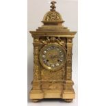 JAPY FR?RES ET CIE, A 19TH CENTURY GILDED BRONZE MANTLE CLOCK Having a dome top set with crouching