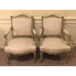 A PAIR OF LATE 19TH CENTURY FRENCH OPEN ARMCHAIRS, with painted and decorated frames , in oatmeal