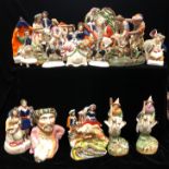 A COLLECTION OF EARLY 19TH CENTURY STAFFORDSHIRE FIGURES, to include a pair of witches riding