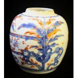 A GOOD KANGXI CHINESE IMARI GINGER JAR Attractively decorated with a basket of flowers in a walled
