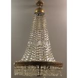 A LARGE GILT BRONZE AND CRYSTAL HUNG BASKET CHANDELIER, Mid 20th Century 68 diameter x 100 drop