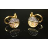 A PAIR OF 18CT GOLD AND DIAMOND BI-COLOUR EARRINGS Each earring with an arrangement of fourteen