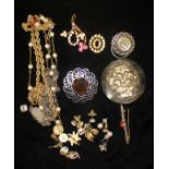 A SELECTION OF COSTUME JEWELLERY Comprising of an antique tortoise shell and brass belt buckle