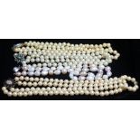 FOUR PEARL NECKLACES, to include two single-row and two double-row necklaces, one with an oval