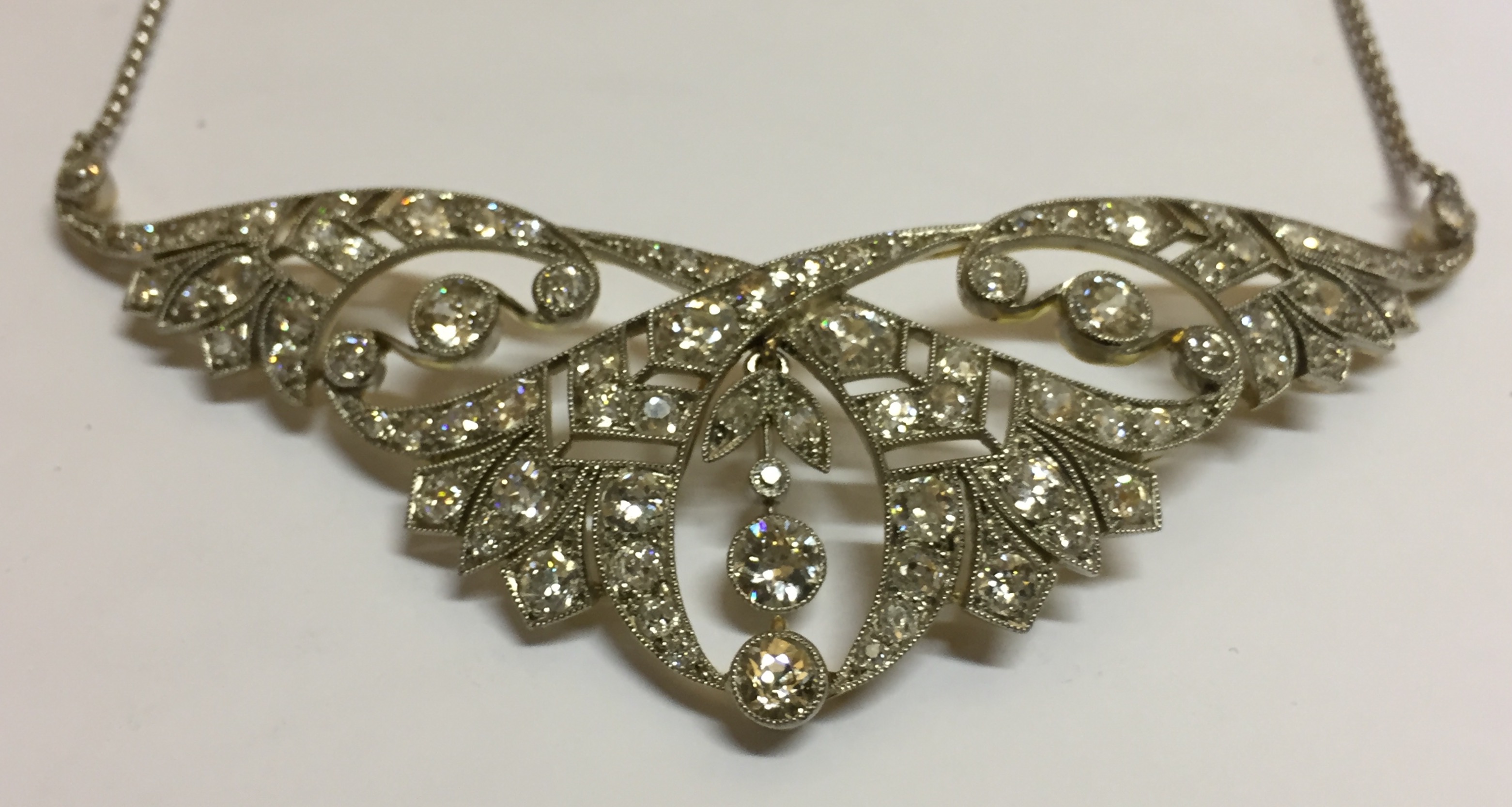 A 18CT GOLD, PLATINUM AND DIAMOND 'TIARA' NECKLACE Having approximately eighty round cut diamonds