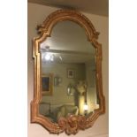 IN THE MANNER OF WILLIAM KENT a large 19th century carved gilt wood framed mirror, the egg and dart