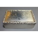A LARGE VICTORIAN SILVER SNUFF BOX The engine turned lid centred by engraved 'C' scroll