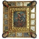 A PAIR OF ANTIQUE SPANISH/PORTUGUESE OILS ON VELUM Saintly figures, giltwood frames inset with